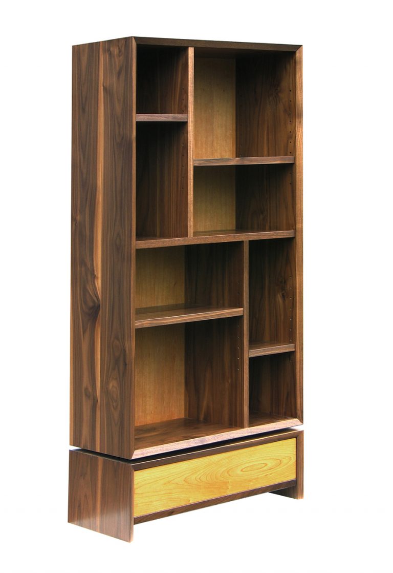 'Floating' bookcase in American Black Walnut with Cherry drawer